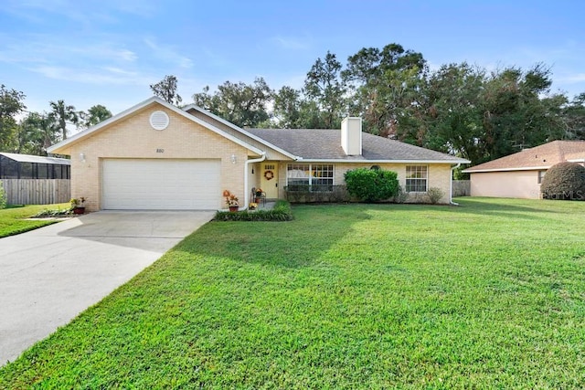 single story home with a garage and a front yard