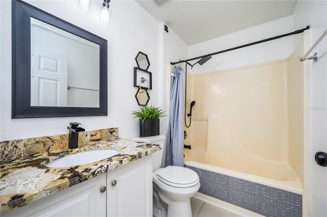 full bathroom featuring vanity, tile patterned floors, toilet, and shower / tub combo