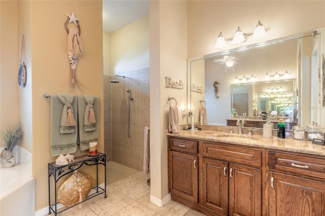 bathroom with ceiling fan, tile patterned flooring, vanity, and independent shower and bath