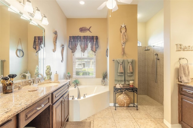 bathroom featuring tile patterned floors, vanity, ceiling fan, and independent shower and bath