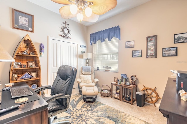 home office with ceiling fan and light tile patterned flooring