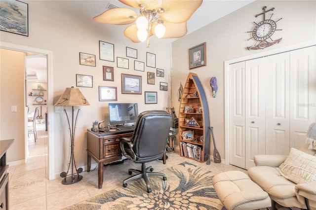 tiled home office with ceiling fan