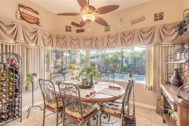 dining space featuring ceiling fan