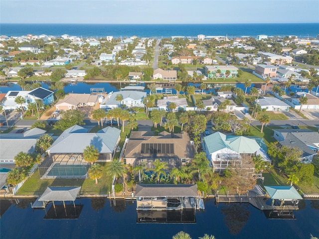 drone / aerial view with a water view