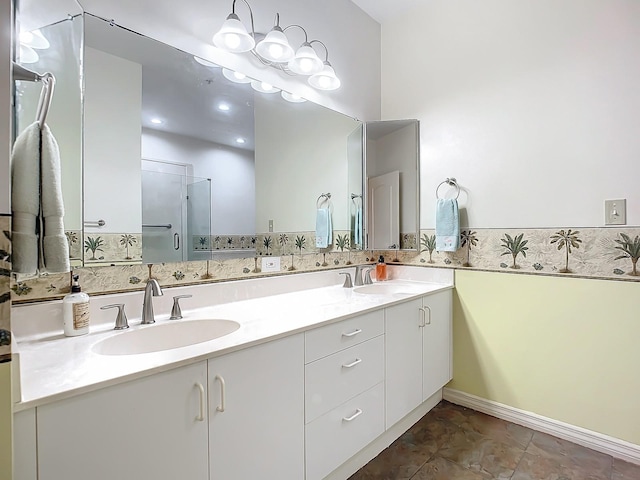 bathroom with walk in shower and vanity