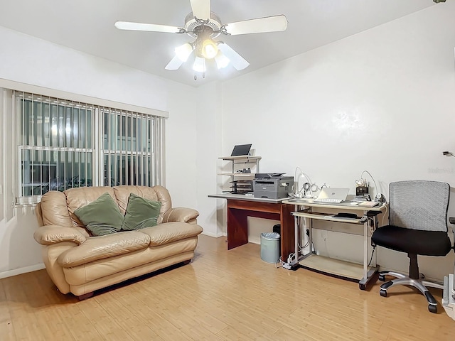 office space featuring light hardwood / wood-style flooring and ceiling fan