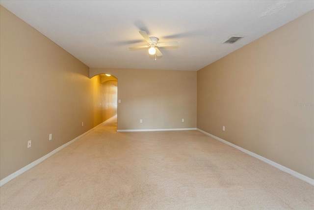 carpeted empty room with ceiling fan