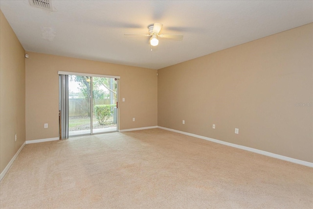 unfurnished room with light carpet and ceiling fan