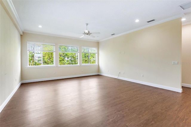 unfurnished room featuring dark wood-type flooring, ceiling fan, and ornamental molding