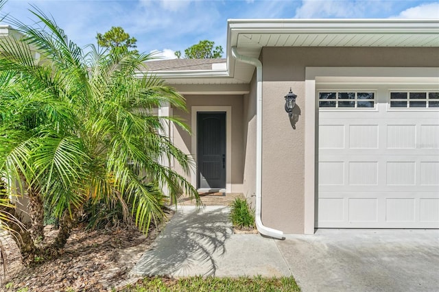 entrance to property featuring a garage