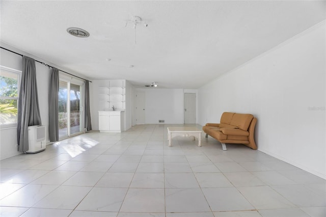 unfurnished room featuring a textured ceiling