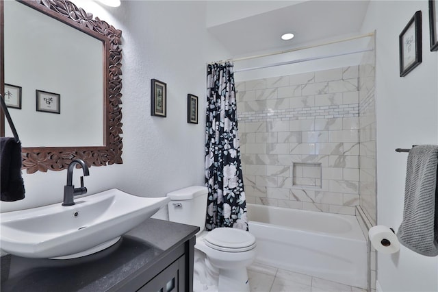 full bathroom featuring shower / tub combo with curtain, vanity, and toilet