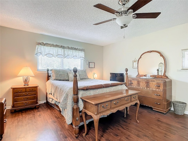 bedroom featuring a textured ceiling, dark hardwood / wood-style flooring, and ceiling fan