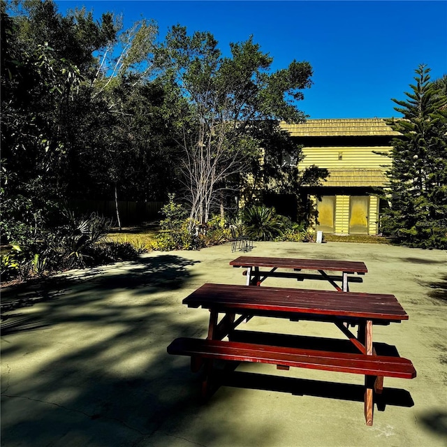 view of home's community with a patio
