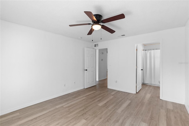 unfurnished bedroom with light wood-type flooring and ceiling fan