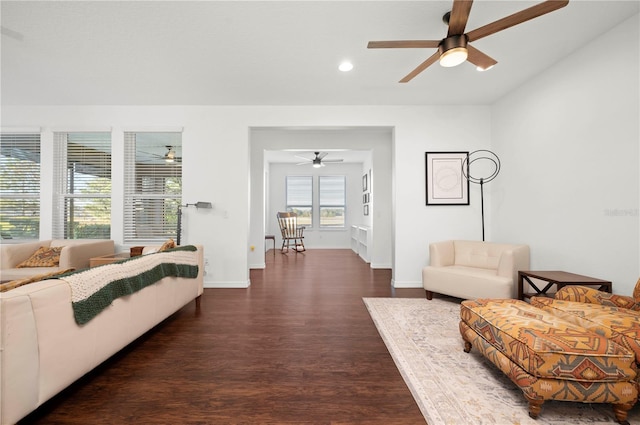 living room featuring dark wood-type flooring