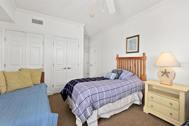 carpeted bedroom with ornamental molding and ceiling fan