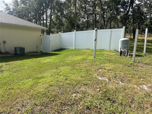 view of yard featuring central AC