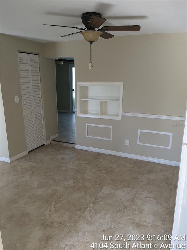 empty room with ceiling fan