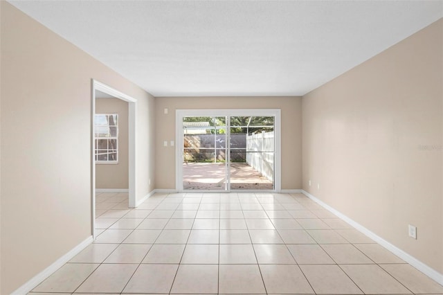 view of tiled spare room