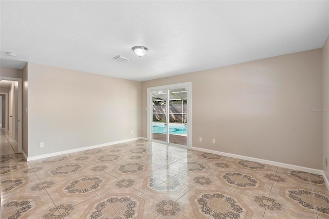 view of tiled spare room