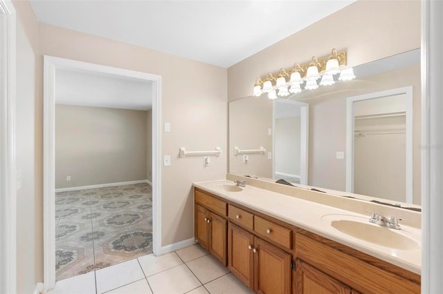 bathroom with tile patterned flooring and vanity