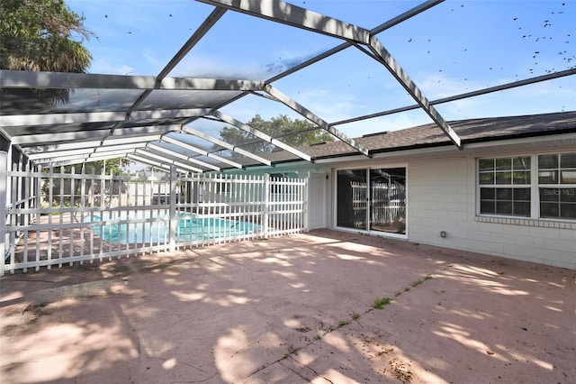 view of pool featuring a patio and a lanai