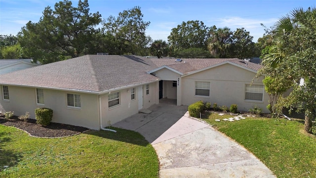 single story home featuring a front yard