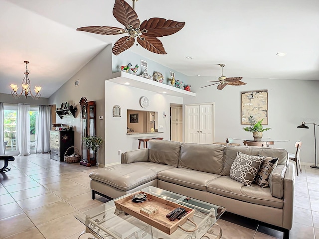 living room featuring a chandelier, high vaulted ceiling, and light tile patterned flooring