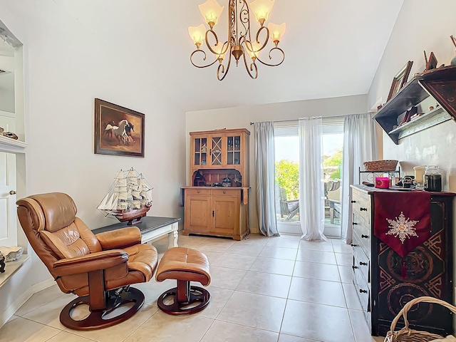 living area with a chandelier, lofted ceiling, and light tile patterned flooring