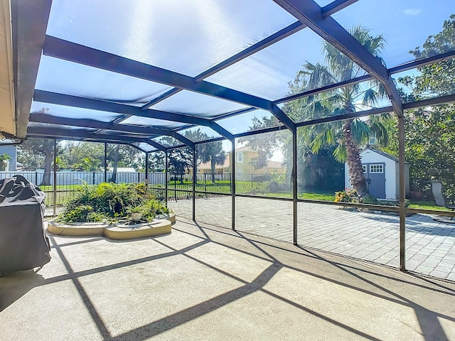 unfurnished sunroom with a swimming pool