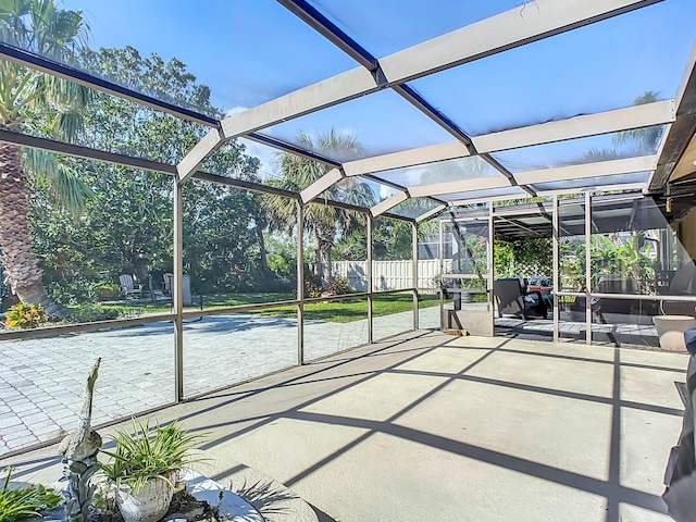 view of patio / terrace with a lanai