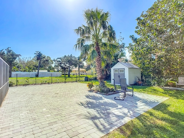 view of patio featuring a storage shed