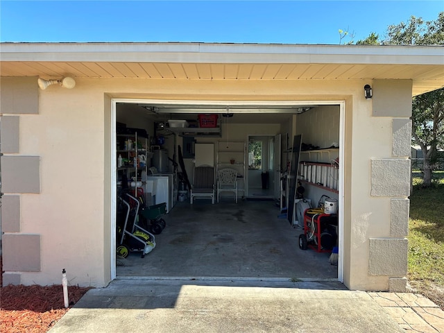 garage featuring washer / clothes dryer