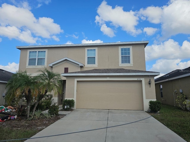 view of front of property with a garage