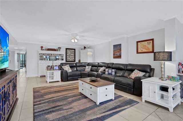 living room with light tile patterned floors, ceiling fan, and ornamental molding