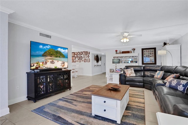 living room with ceiling fan, ornamental molding, and light tile patterned floors