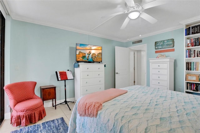 tiled bedroom with ceiling fan and ornamental molding