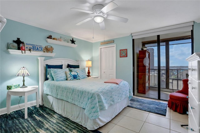 bedroom with access to exterior, light tile patterned floors, ceiling fan, and ornamental molding