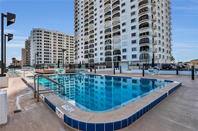 view of swimming pool featuring a patio