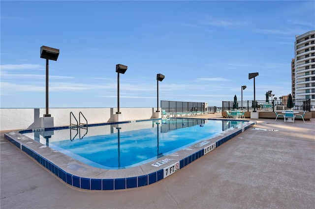 view of pool with a patio area