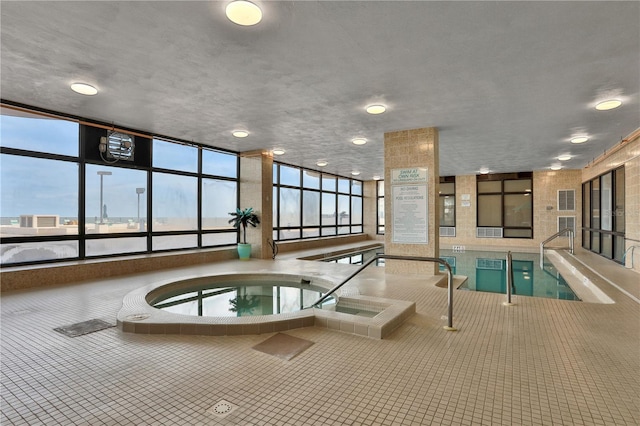 view of pool with an indoor in ground hot tub