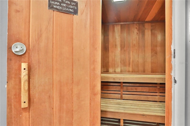 view of sauna / steam room with wooden walls