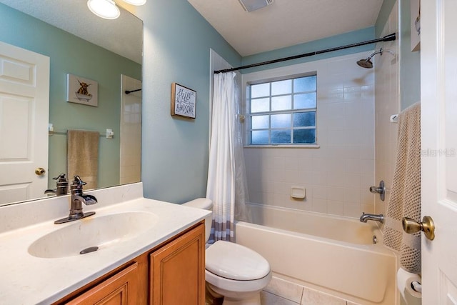 full bathroom with tile patterned flooring, vanity, toilet, and shower / bath combo