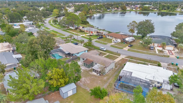 drone / aerial view with a water view