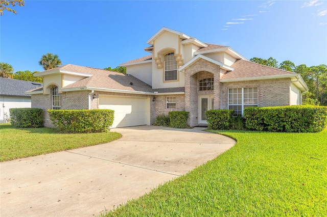 view of front of property featuring a garage and a front lawn