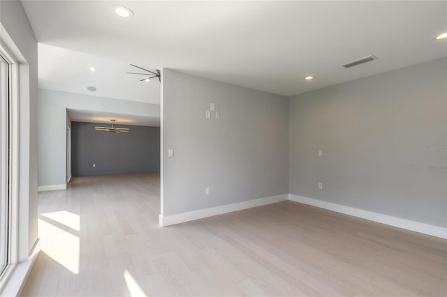 unfurnished room with light hardwood / wood-style floors and ceiling fan