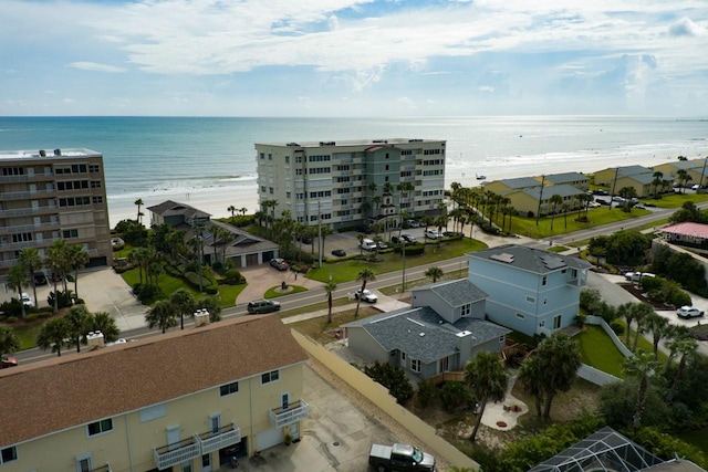 aerial view with a view of the beach and a water view