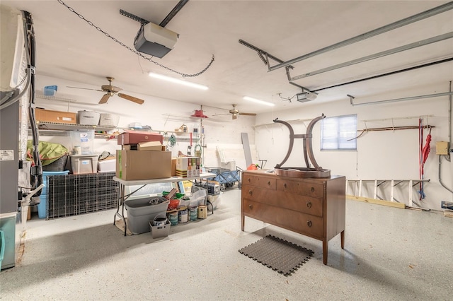 garage featuring ceiling fan and a garage door opener