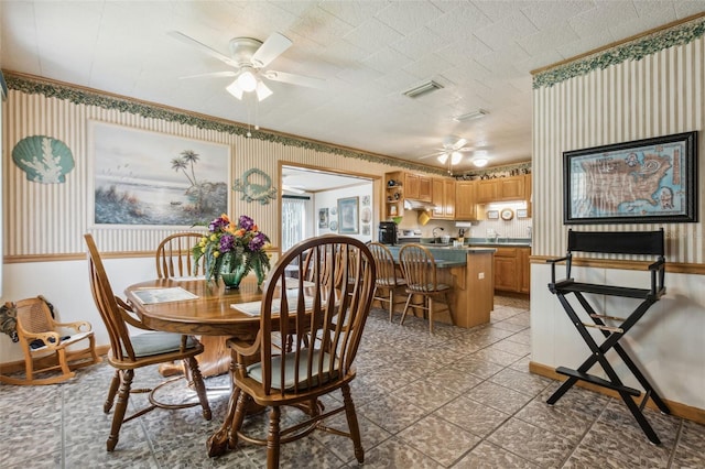 dining area featuring ceiling fan